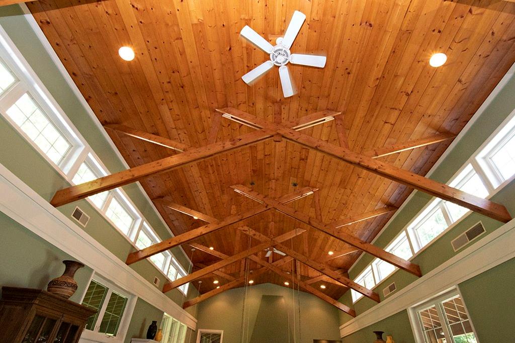 130 Lions Road Butler, PA 16001 - Photo 7 of 25 Wood lined with architectural beams, recessed lighting, and rows of windows. The ceiling of the great room is breathtaking.
