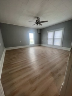 31383 East Five Points Road Kingston, IL 60145 - Photo 12 of 25 an empty room with windows and fan