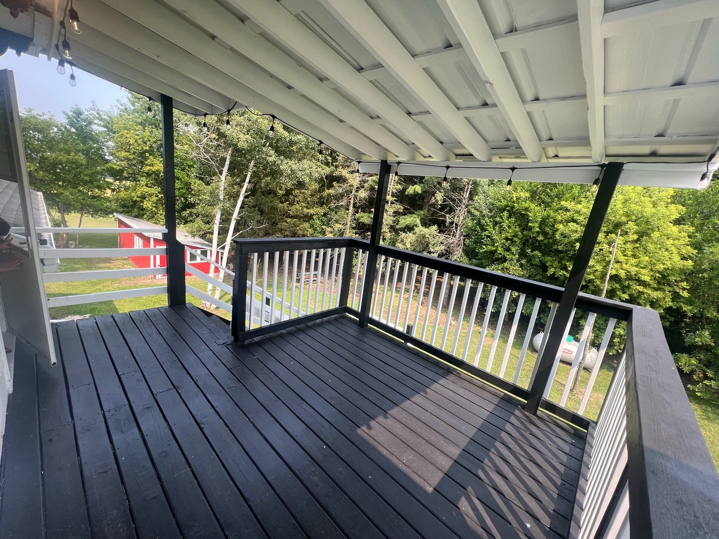 31383 East Five Points Road Kingston, IL 60145 - Photo 19 of 25 a view of porch with wooden floor