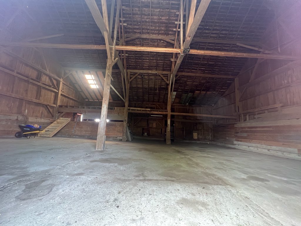 31383 East Five Points Road Kingston, IL 60145 - Photo 22 of 25 a view of an empty room with wooden floor