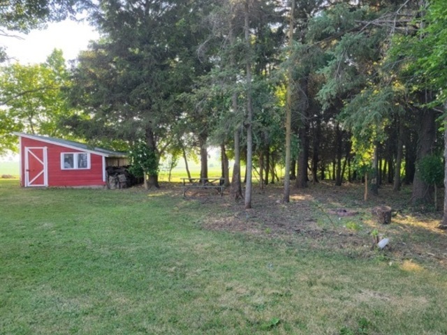 31383 East Five Points Road Kingston, IL 60145 - Photo 24 of 25 a view of outdoor space with deck and yard