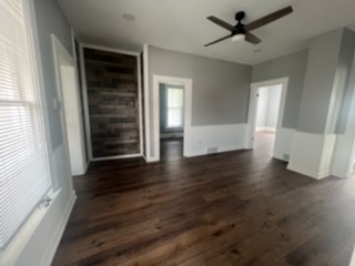 31383 East Five Points Road Kingston, IL 60145 - Photo 6 of 25 a view of an empty room with wooden floor and a window