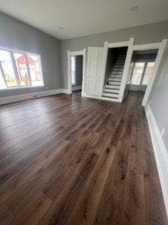 31383 East Five Points Road Kingston, IL 60145 - Photo 9 of 25 an empty room with wooden floor and windows