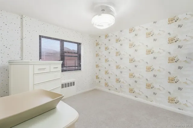 a bathroom with a sink a mirror and a shower