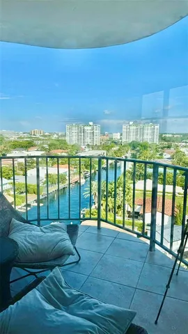 a view of a city street from a balcony