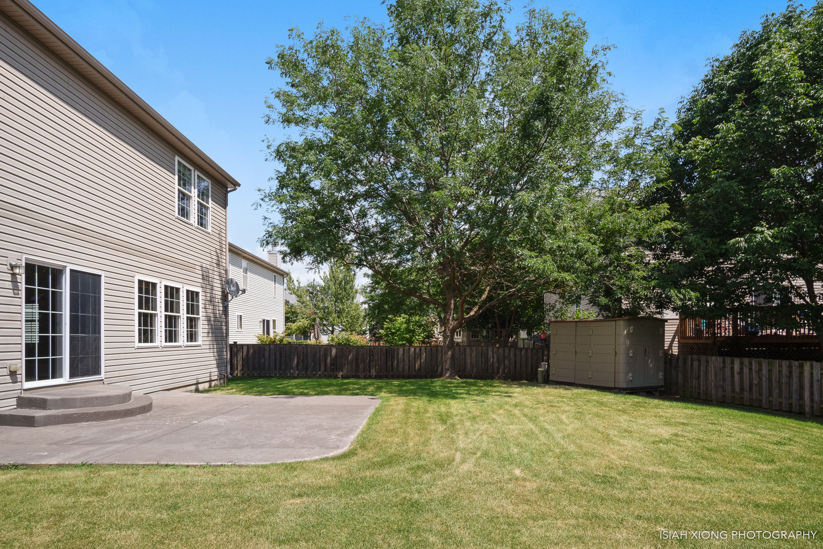 3255 Marbill Farm Road Montgomery, IL 60538 - Photo 21 of 22 a backyard of a house with plants and tree