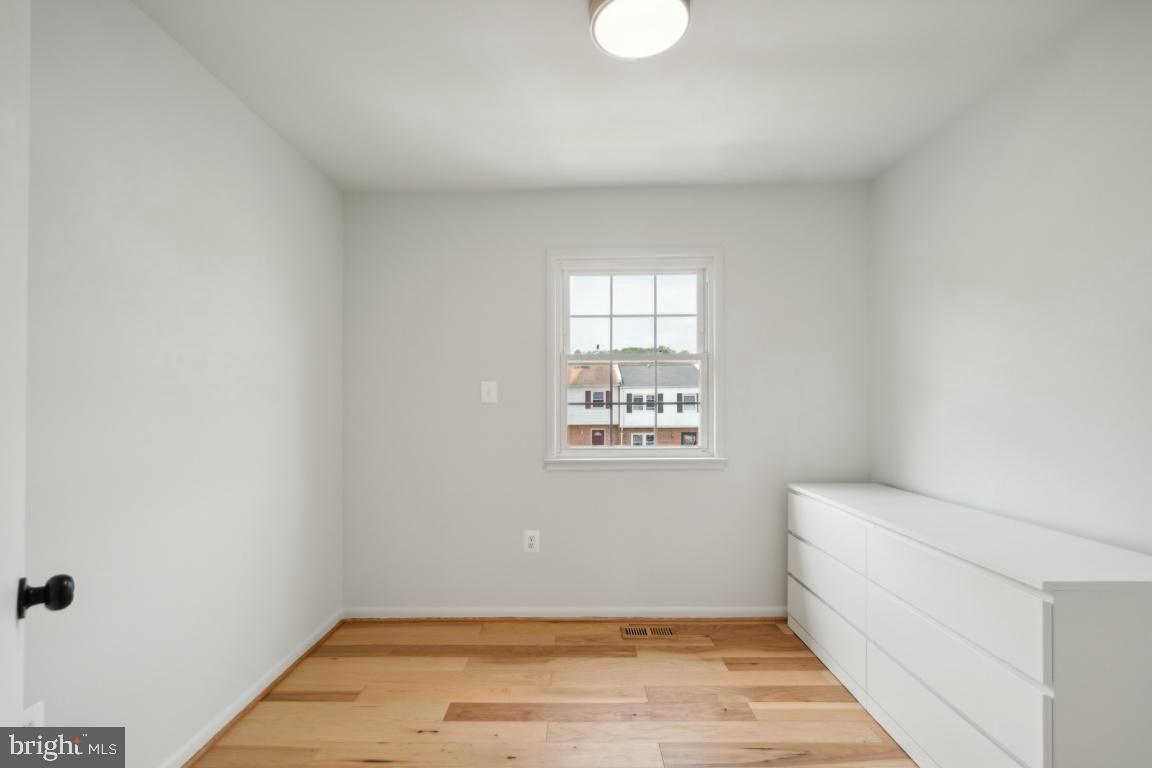 2400 Kilpatrick Place Dumfries, VA 22026 - Photo 16 of 20 a view of an empty room with a window