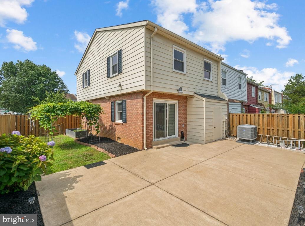 2400 Kilpatrick Place Dumfries, VA 22026 - Photo 20 of 20 a front view of a house with a yard