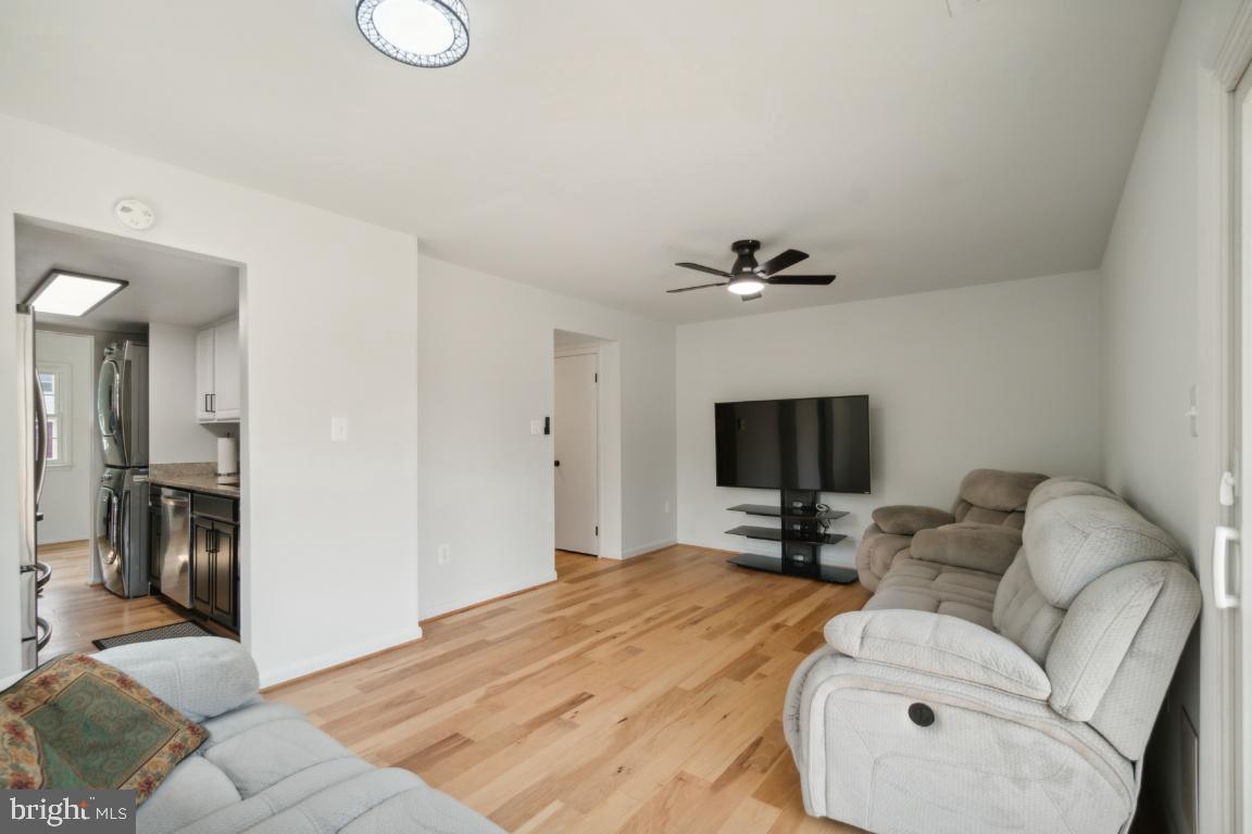 2400 Kilpatrick Place Dumfries, VA 22026 - Photo 6 of 20 a bedroom with furniture and a flat screen tv