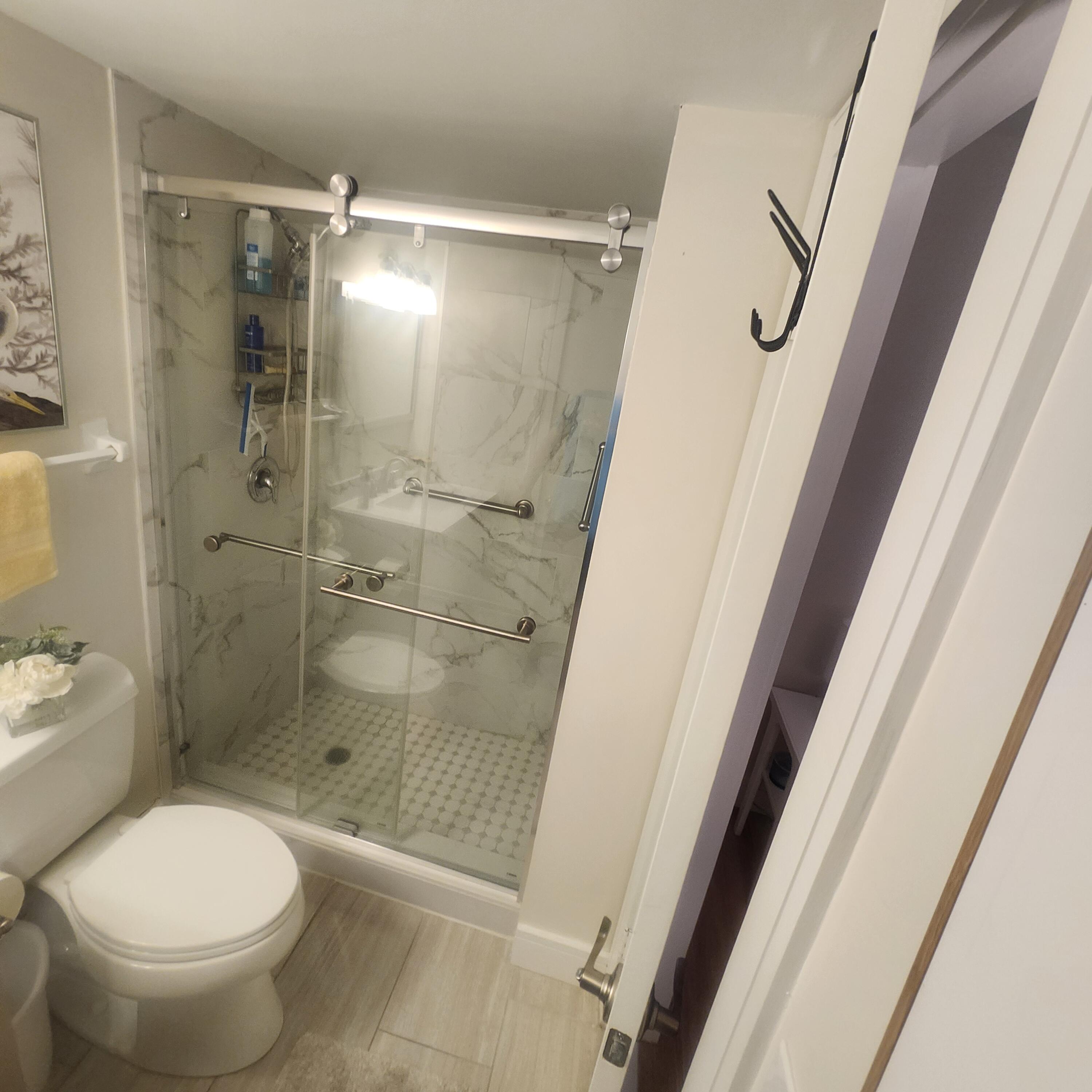 1505 North Riverside Drive, Unit 1108 Pompano Beach, FL 33062 - Photo 10 of 16 a bathroom with a shower and a toilet