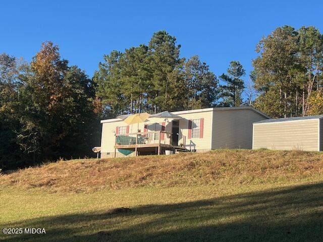 171 Mountain Springs Church Road Macon, GA 31217 - Photo 1 of 13 a view of a house with a yard