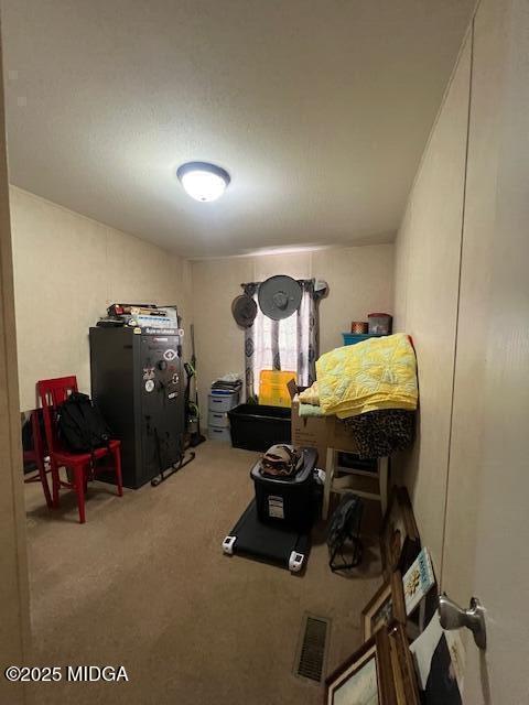 171 Mountain Springs Church Road Macon, GA 31217 - Photo 9 of 13 a bedroom with furniture and a chair