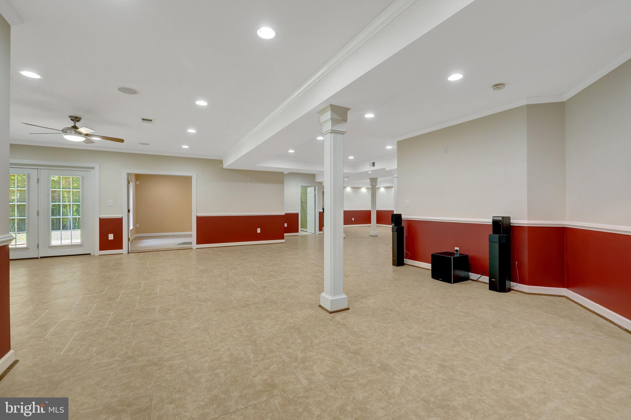 13650 Independence Ridge Nokesville, VA 20181 - Photo 53 of 98 Expansive Finished Lower-Level Recreation Area