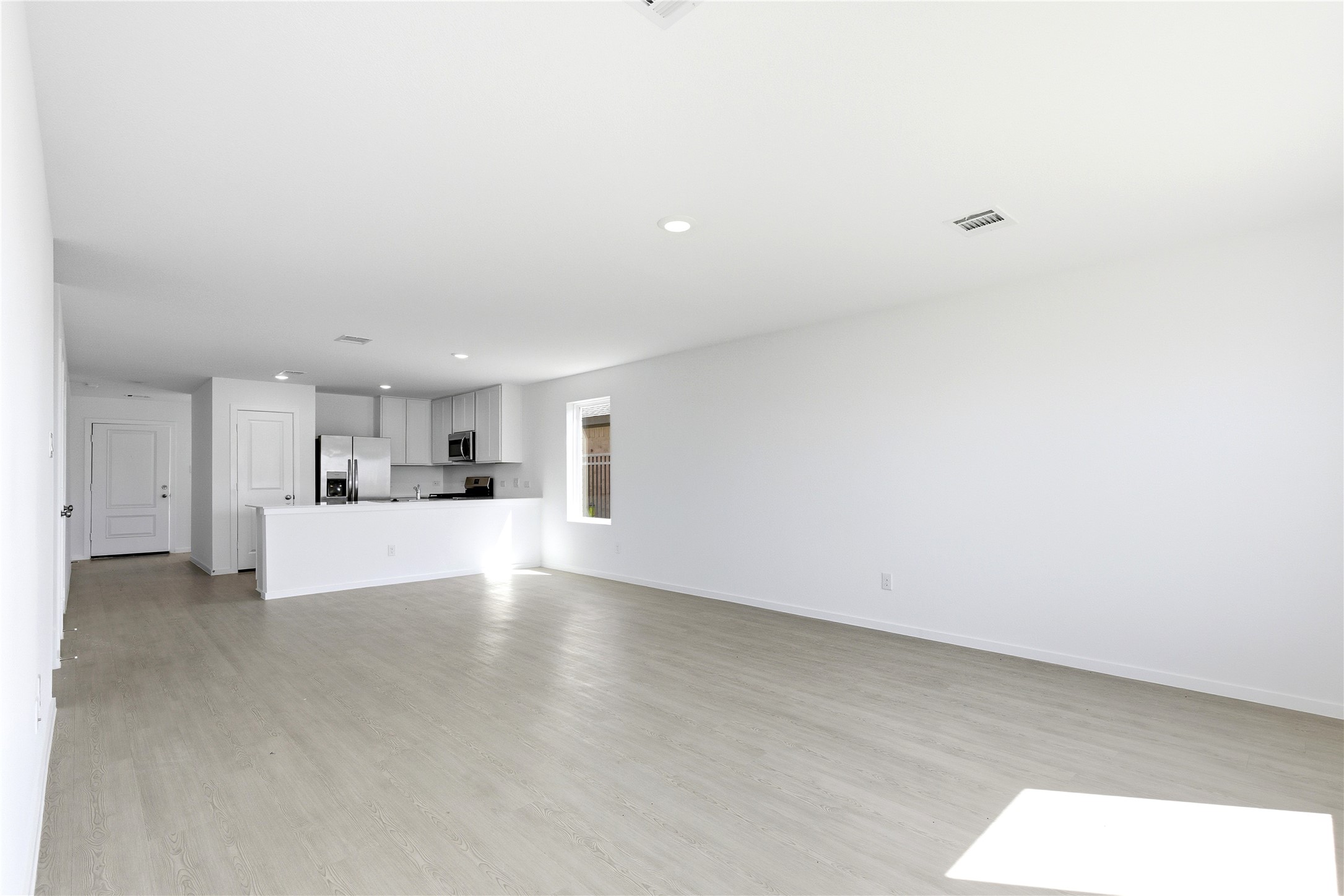 3029 Merganser Ridge Drive Katy, TX 77493 - Photo 23 of 42 a view of a kitchen with a sink cabinets and a window