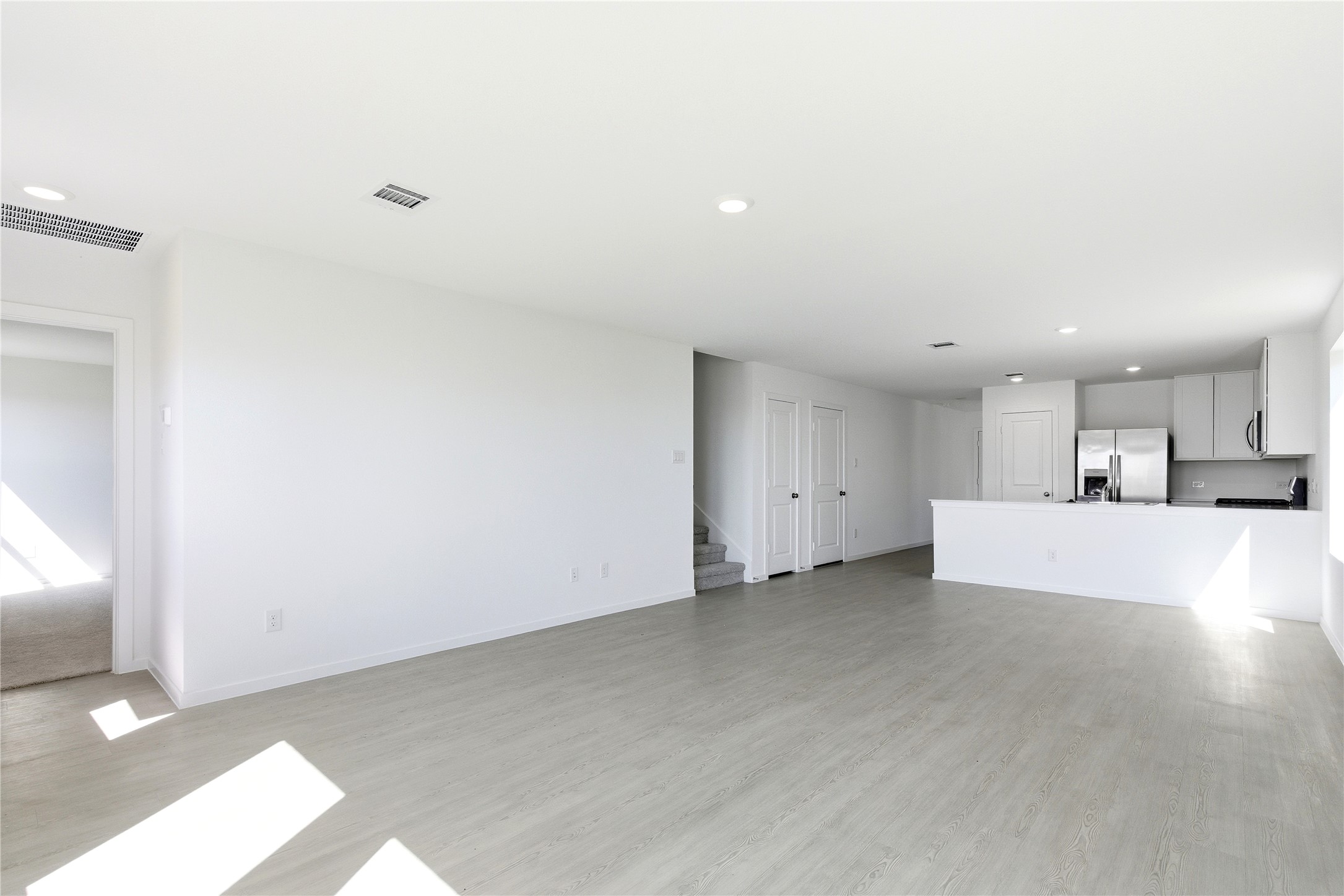 3029 Merganser Ridge Drive Katy, TX 77493 - Photo 7 of 42 a view of a kitchen with a sink and a window