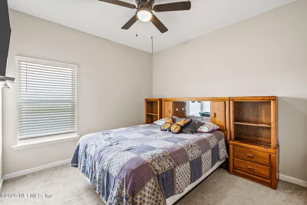 front view of a house with a garden