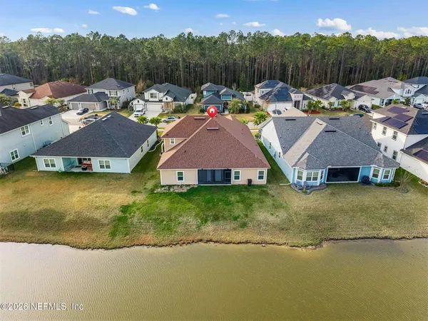 a view of a swimming pool and an outdoor space