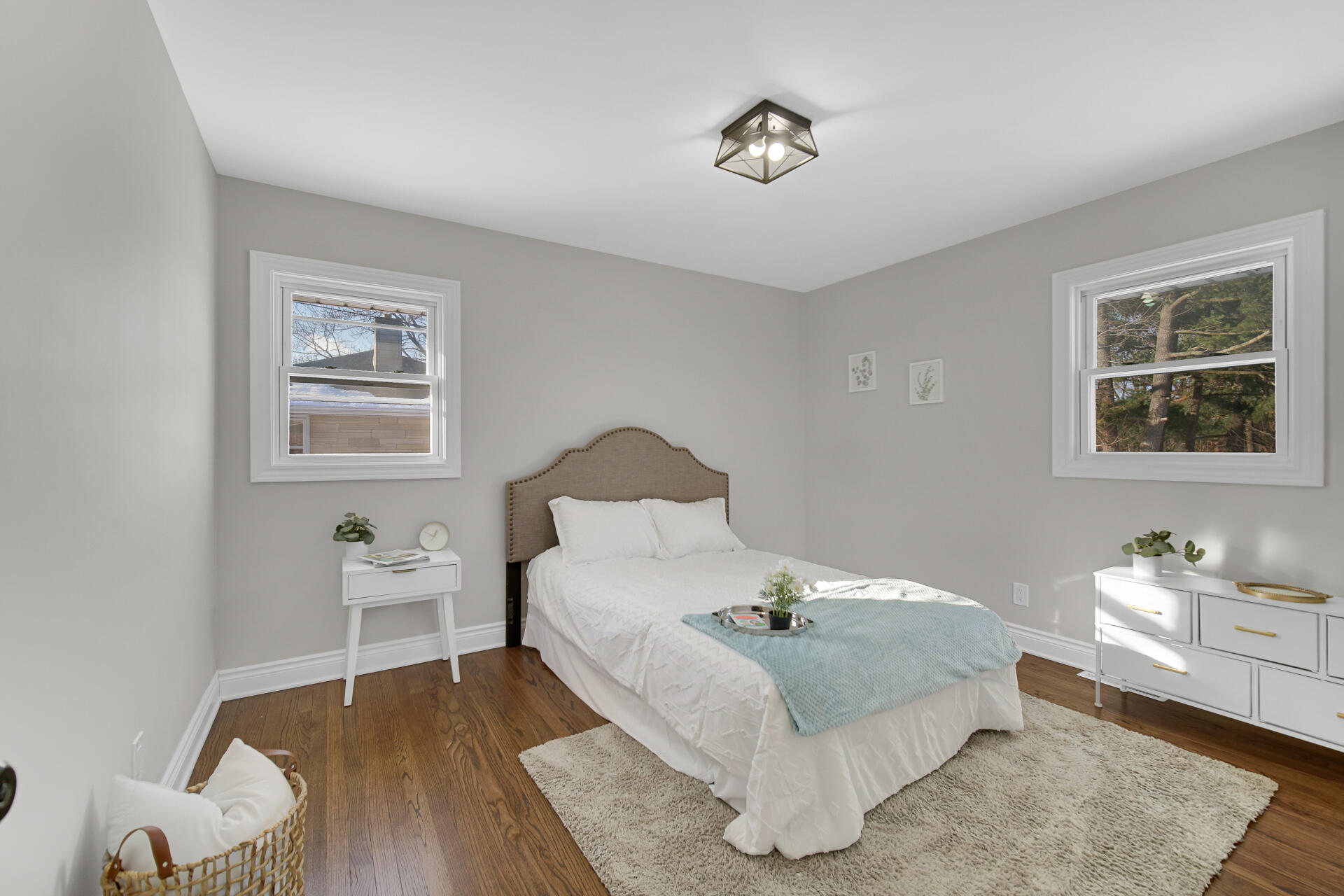 910 High Street Hobart, IN 46342 - Photo 17 of 29 a bed room with a bed and a chair