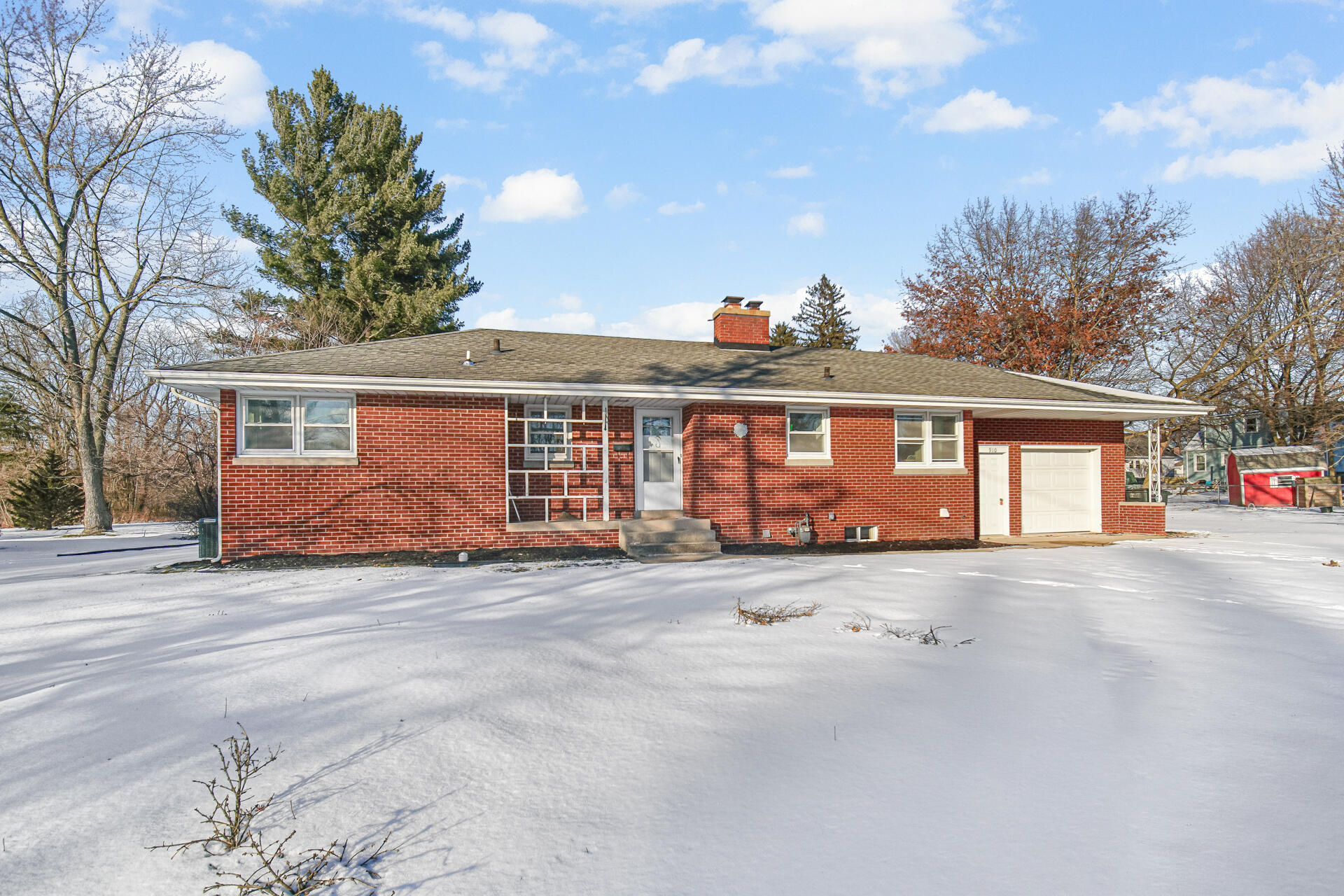 910 High Street Hobart, IN 46342 - Photo 2 of 29 a view of a yard in front of a house
