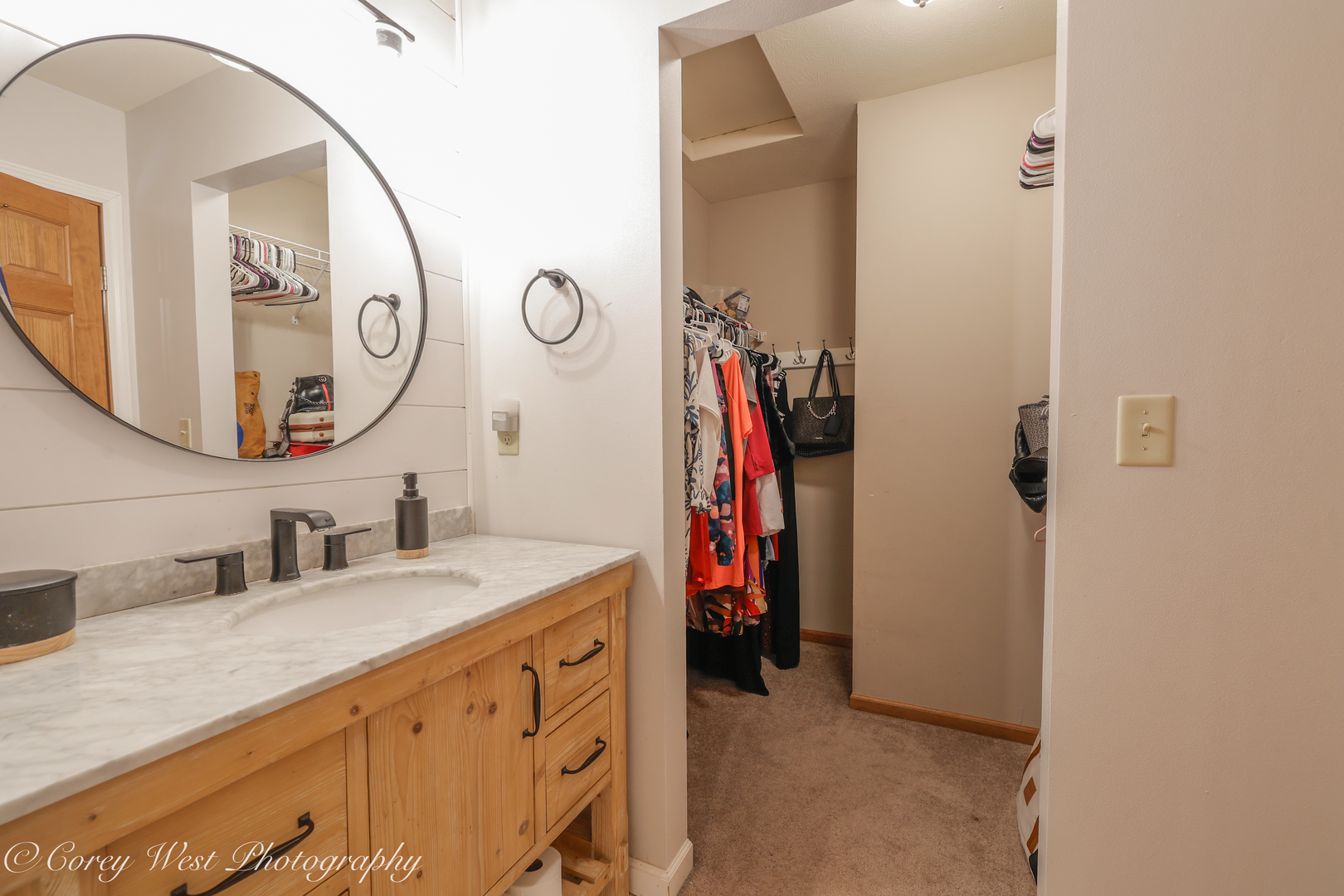 8453 Crooked Bend Road Machesney Park, IL 61115 - Photo 16 of 27 a bathroom with a sink and a mirror