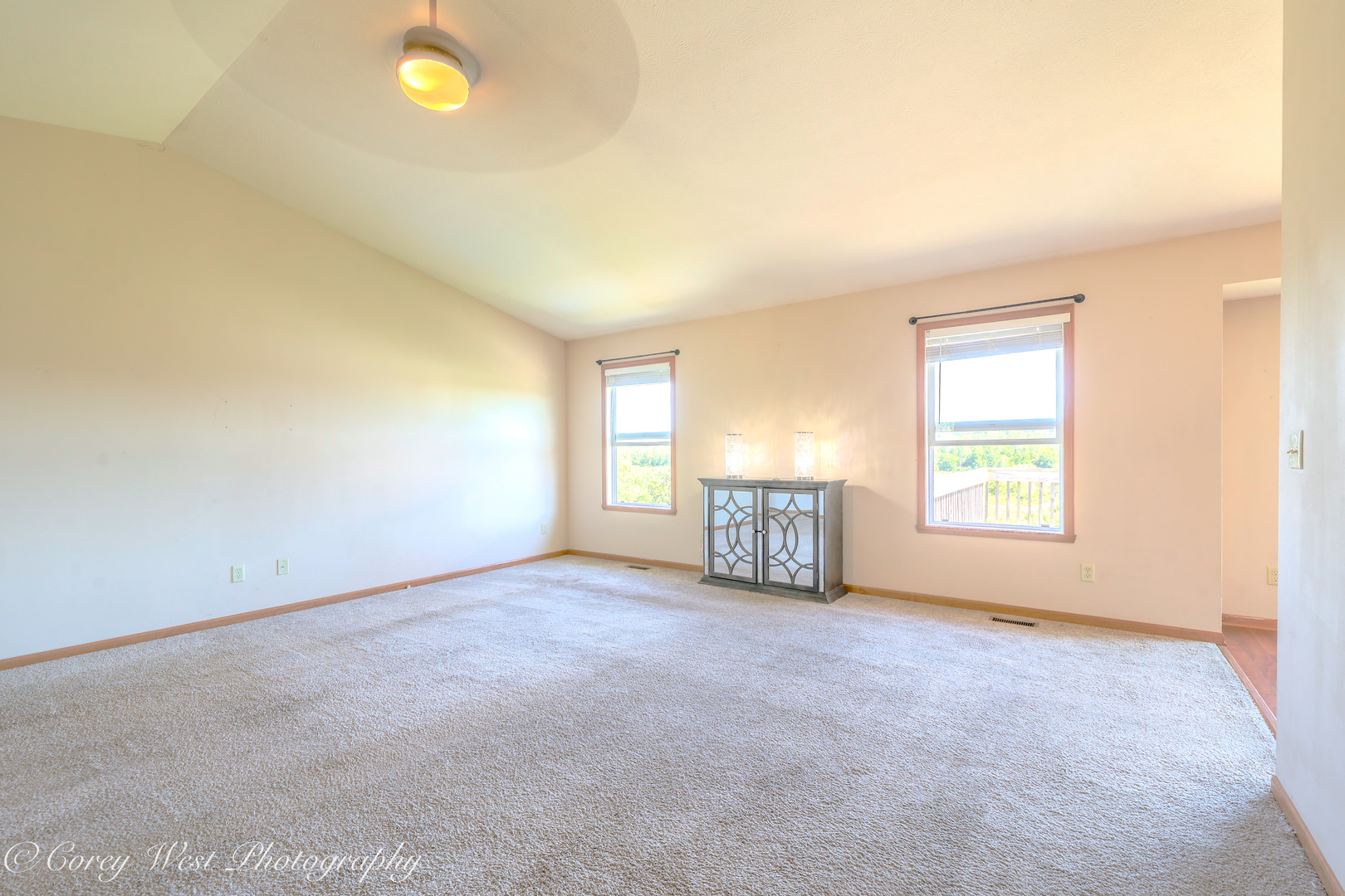 8453 Crooked Bend Road Machesney Park, IL 61115 - Photo 6 of 27 an empty room with windows