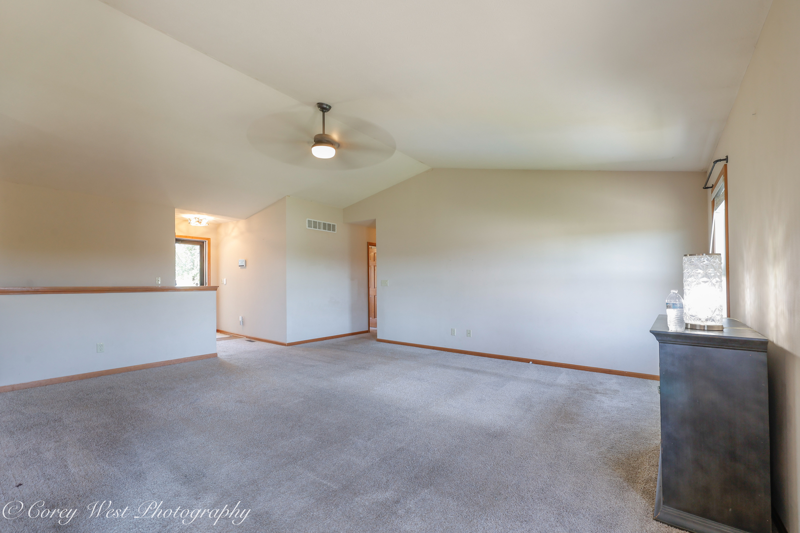 8453 Crooked Bend Road Machesney Park, IL 61115 - Photo 7 of 27 an empty room with a empty space and windows