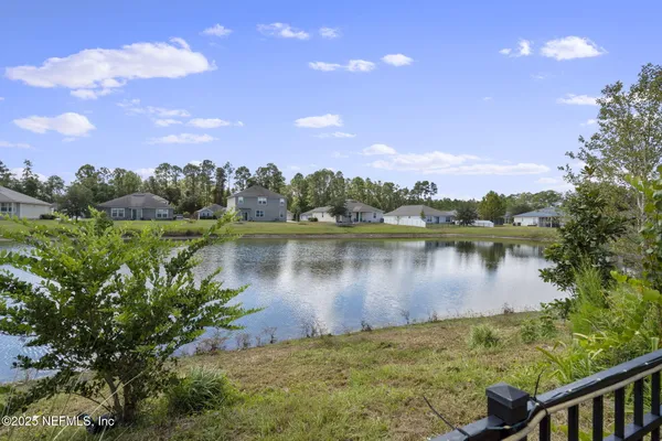 a view of a lake from a yard