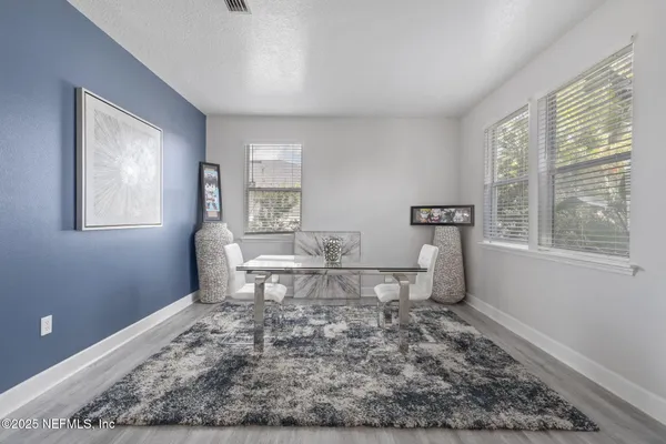 a living room with a couch and a table