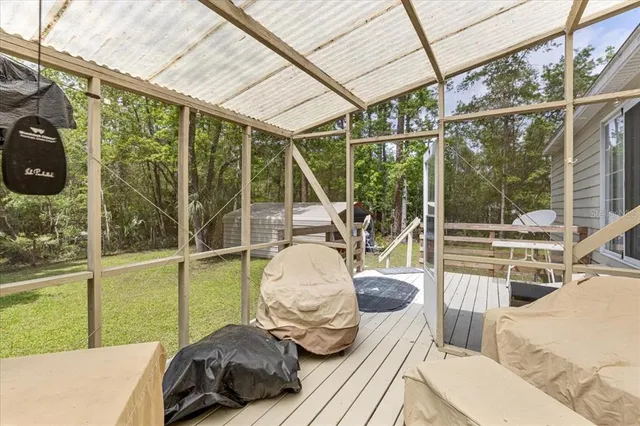 a room with furniture and a large window