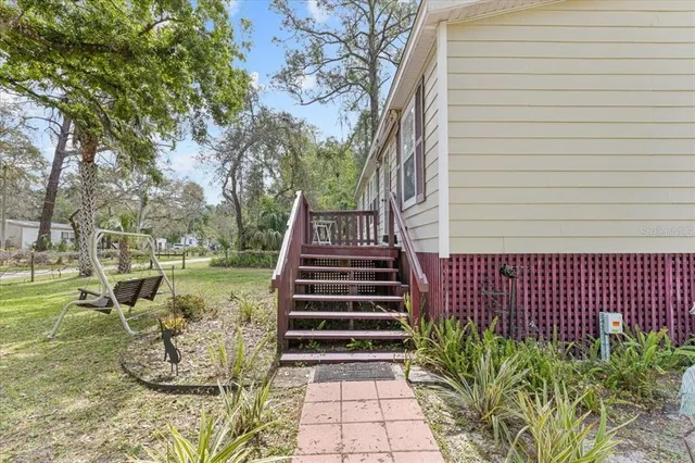 a view of a yard with pathway