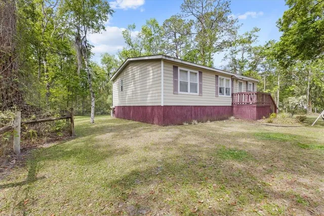 a view of backyard of house
