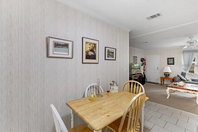 a view of a a dining room with furniture