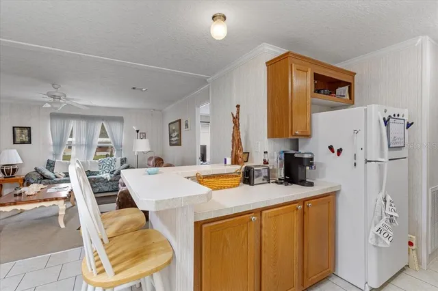 a very nice looking dining room with a table and chairs