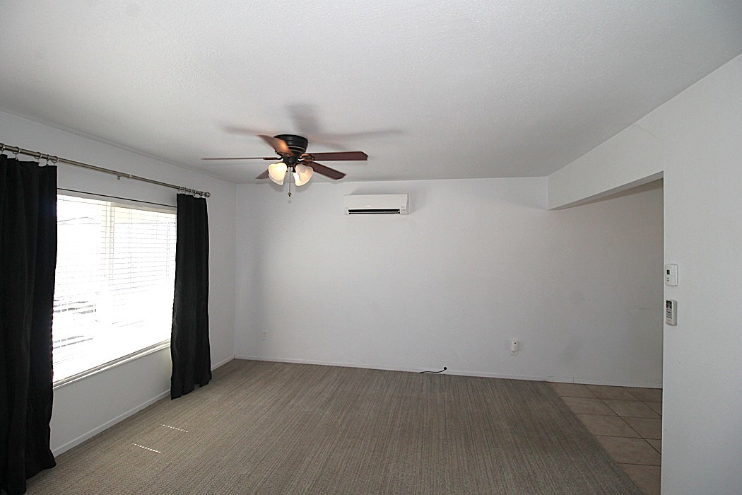 308 Muir Street Barstow, CA 92311 - Photo 11 of 27 an empty room with a window