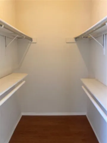 a view of small space with racks on the wall