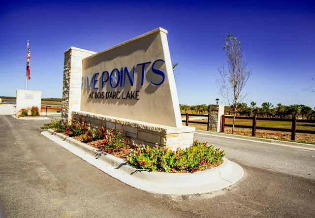 a view of a room with wooden fence