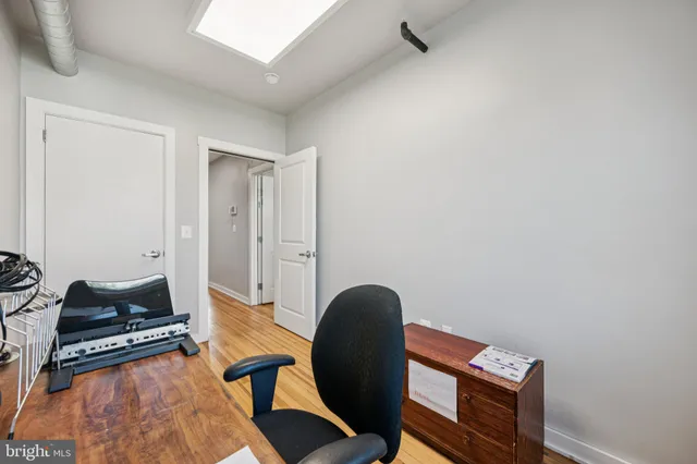 a view of workspace with lounge chair
