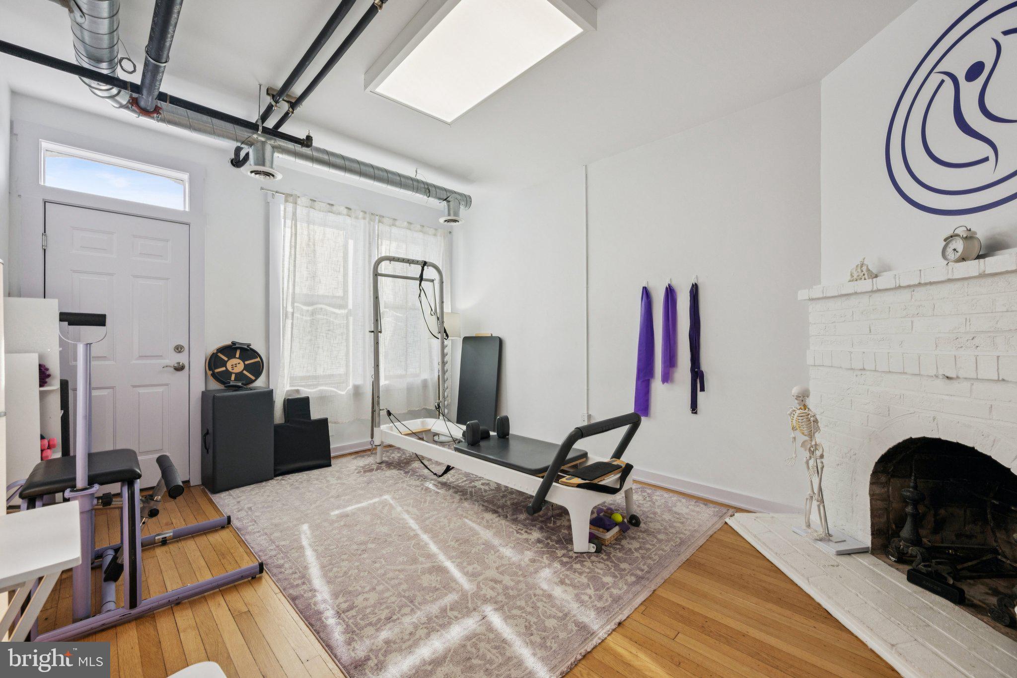 2708 Ontario Road Northwest Washington, DC 20009 - Photo 18 of 31 a view of a livingroom with furniture and a fireplace