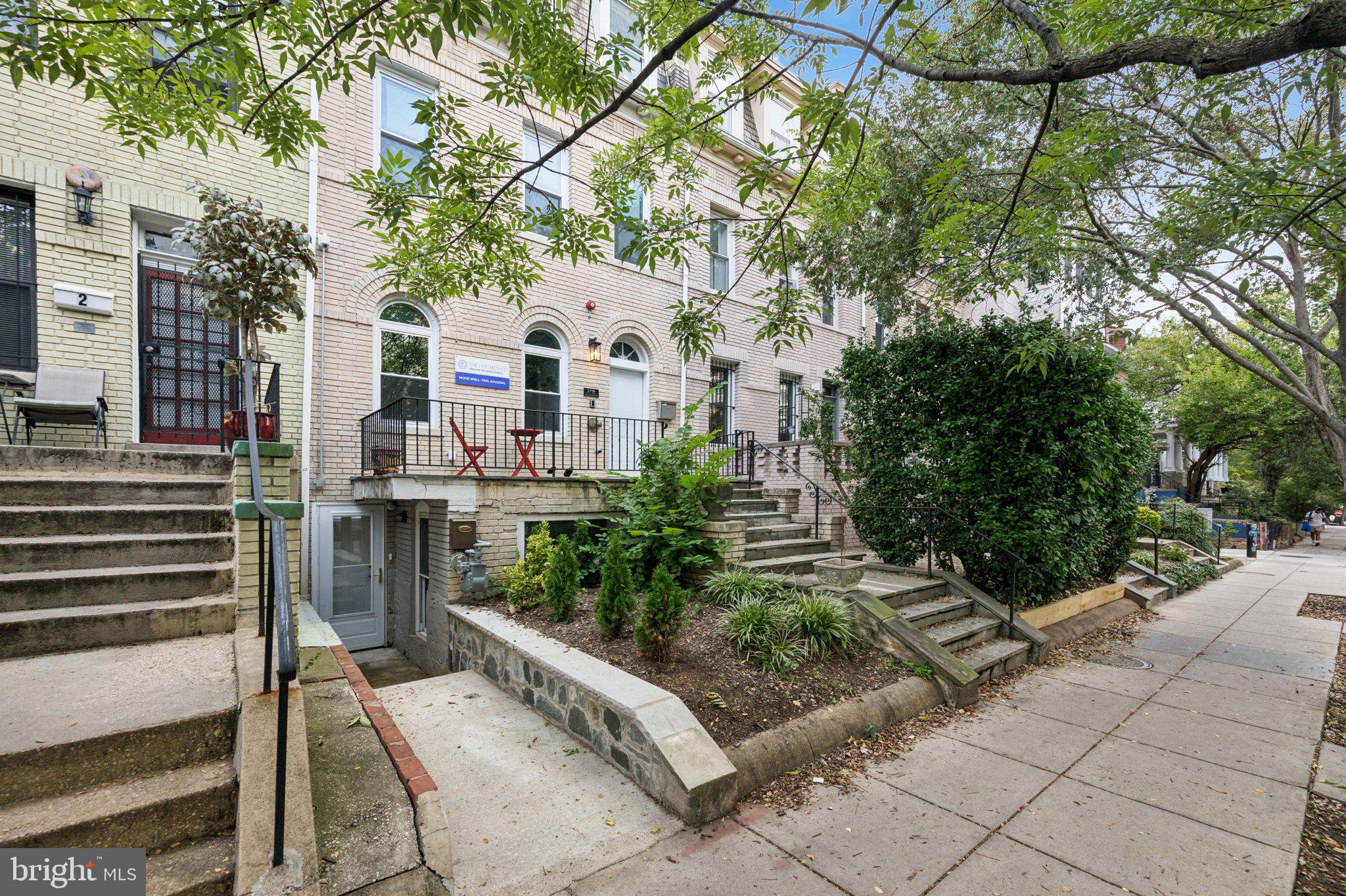 2708 Ontario Road Northwest Washington, DC 20009 - Photo 2 of 31 a view of multiple house with outdoor space