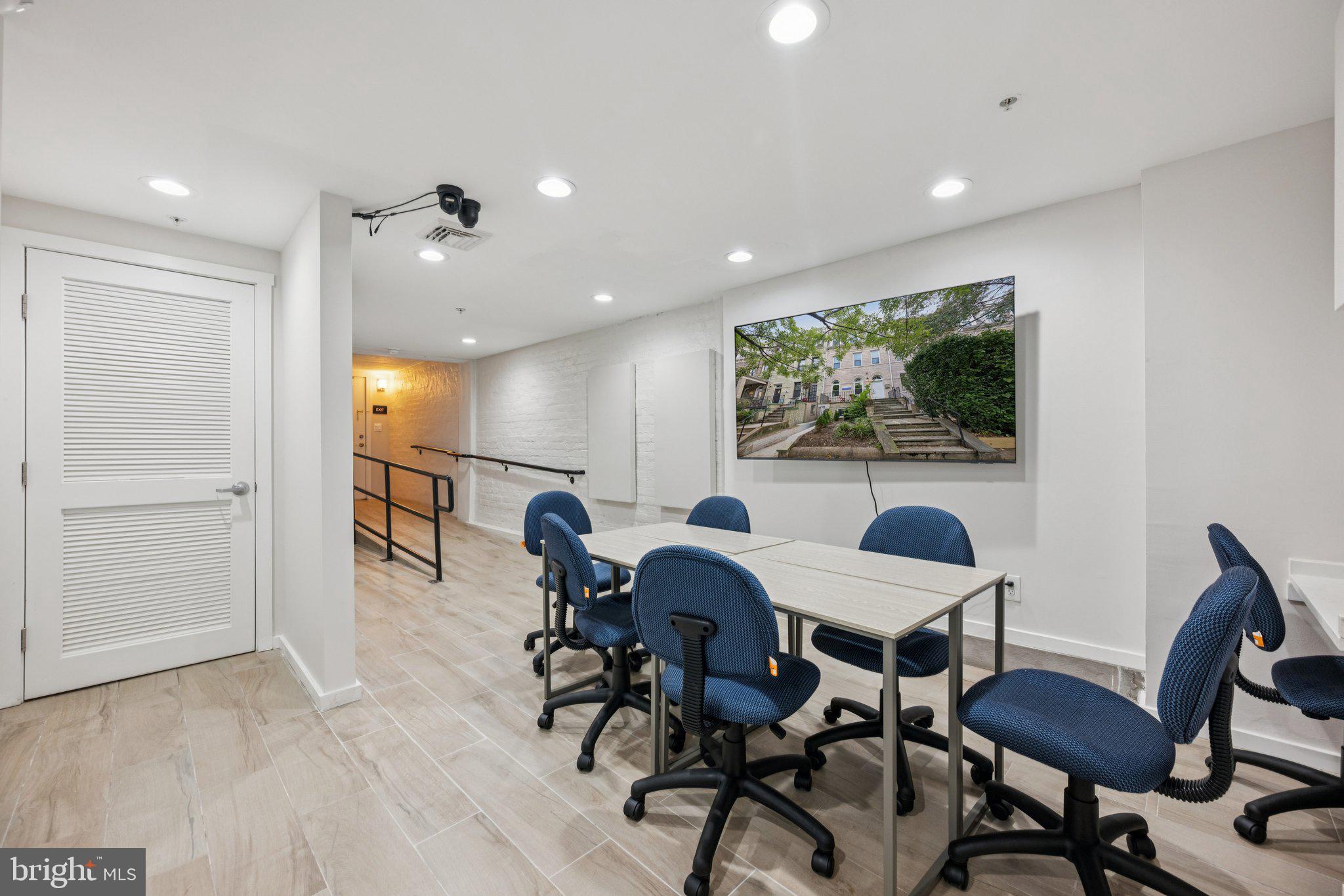 2708 Ontario Road Northwest Washington, DC 20009 - Photo 22 of 31 a view of a dining room with furniture and a potted plant