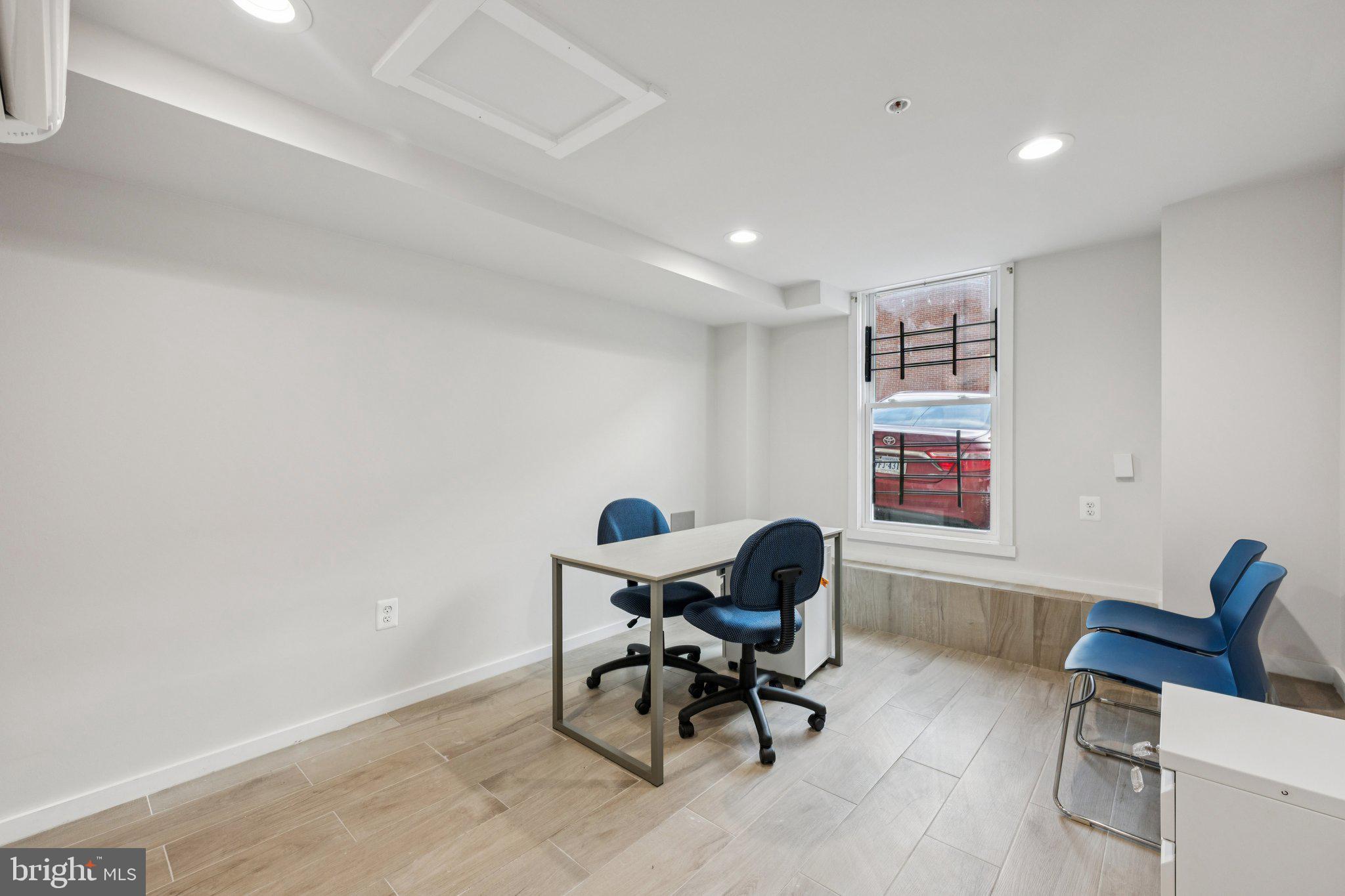 2708 Ontario Road Northwest Washington, DC 20009 - Photo 26 of 31 a workspace with furniture and a window