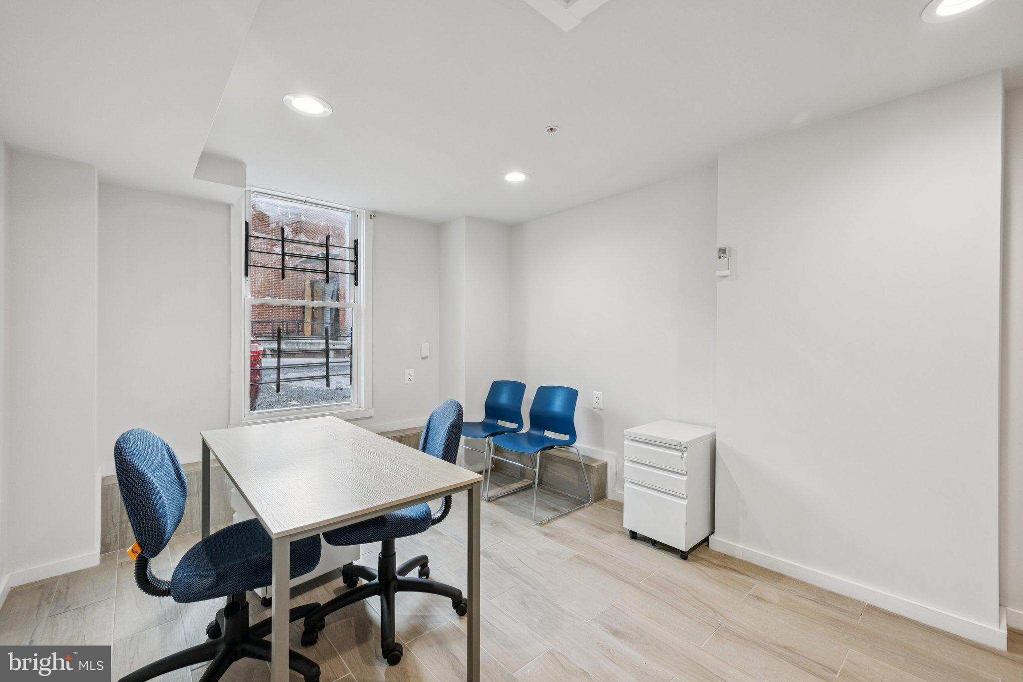 2708 Ontario Road Northwest Washington, DC 20009 - Photo 27 of 31 a view of a dining room with furniture and window