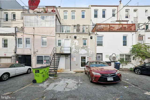 a car parked in front of a building