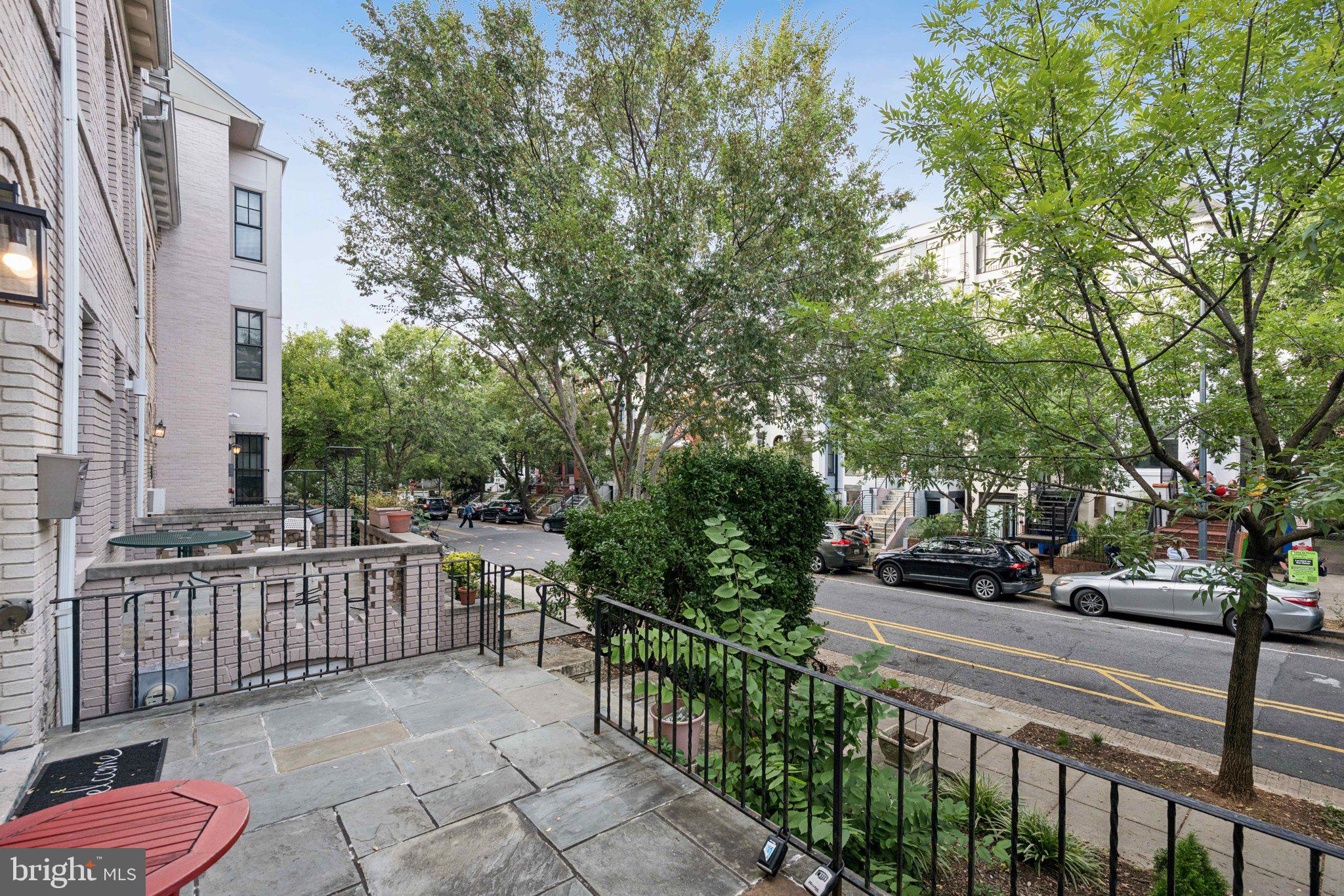 2708 Ontario Road Northwest Washington, DC 20009 - Photo 3 of 31 a view of a street with sitting area