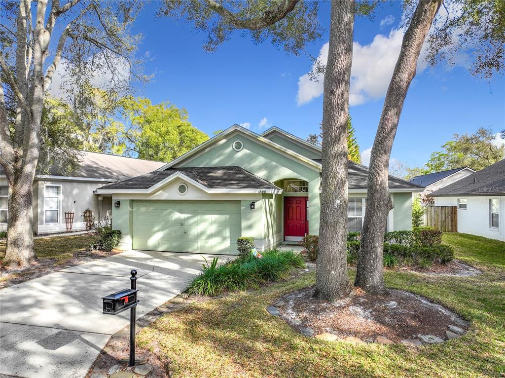 791 Andover Circle Winter Springs, FL 32708 - Photo 1 of 1 a front view of a house with a yard