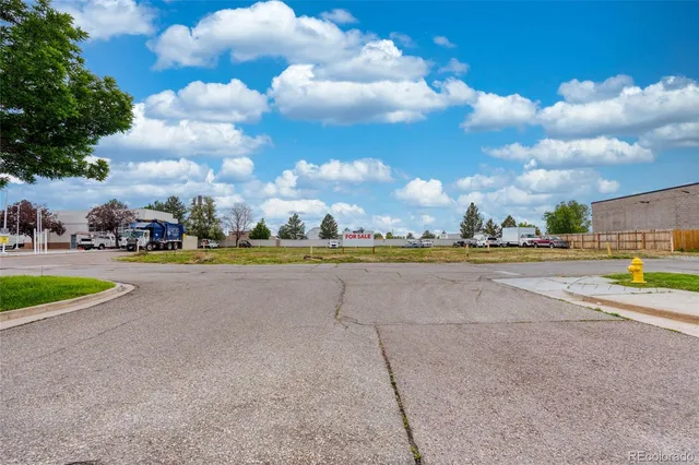 a view of multiple houses with outdoor space