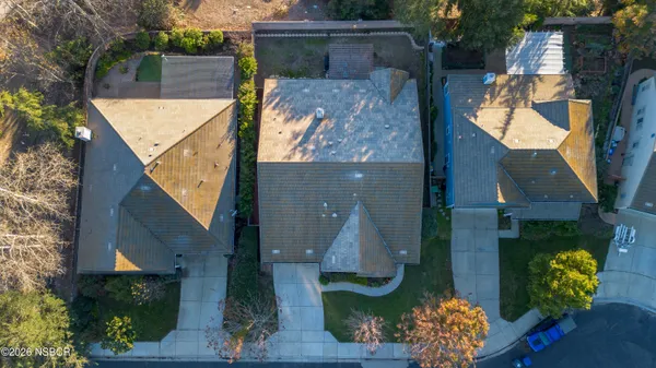 an aerial view of a house with garden