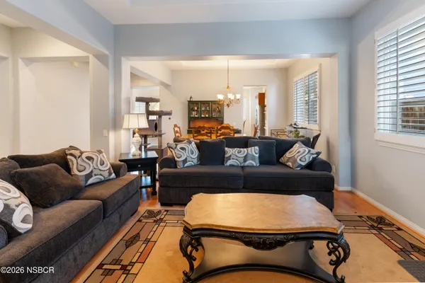 a living room with furniture and a couch