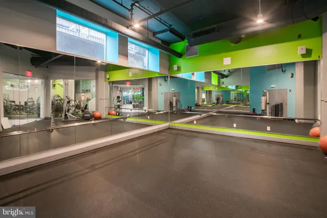 a view of a building with a swimming pool