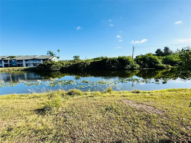 a kitchen with a sink and a stove